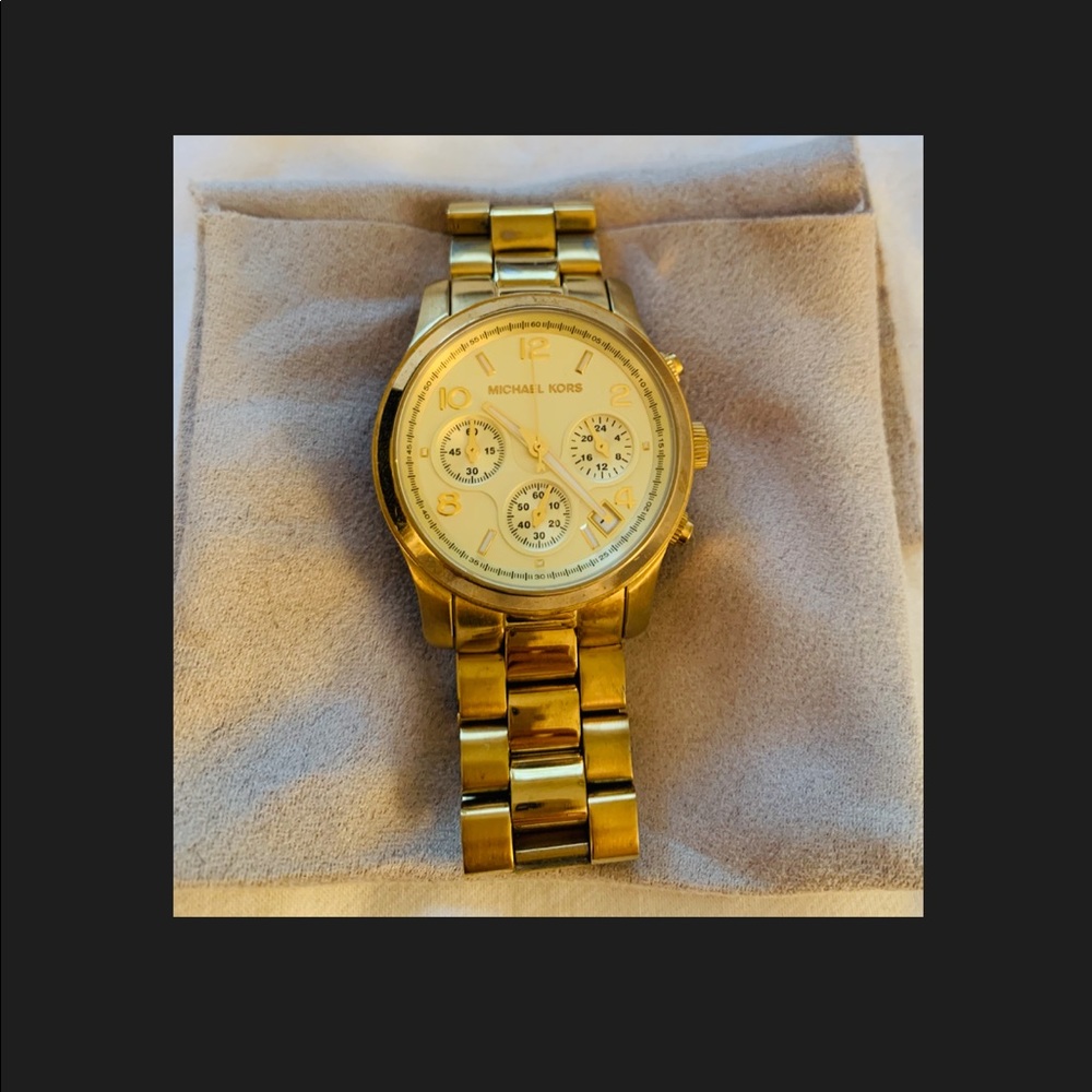 Michael Kors Gold Large Faced watch women’s
